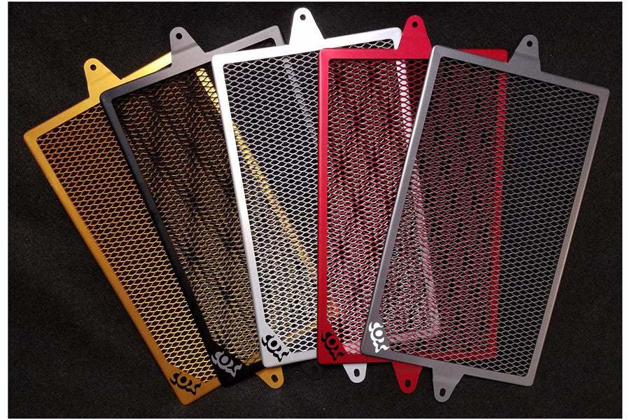 Radiator guards for Kawasaki Er6n by Cox Racing in various colors.