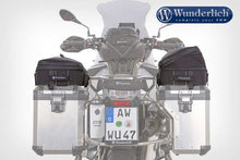 BMW R1200GS with Wunderlich BagPacker III black luggage on rear side cases.