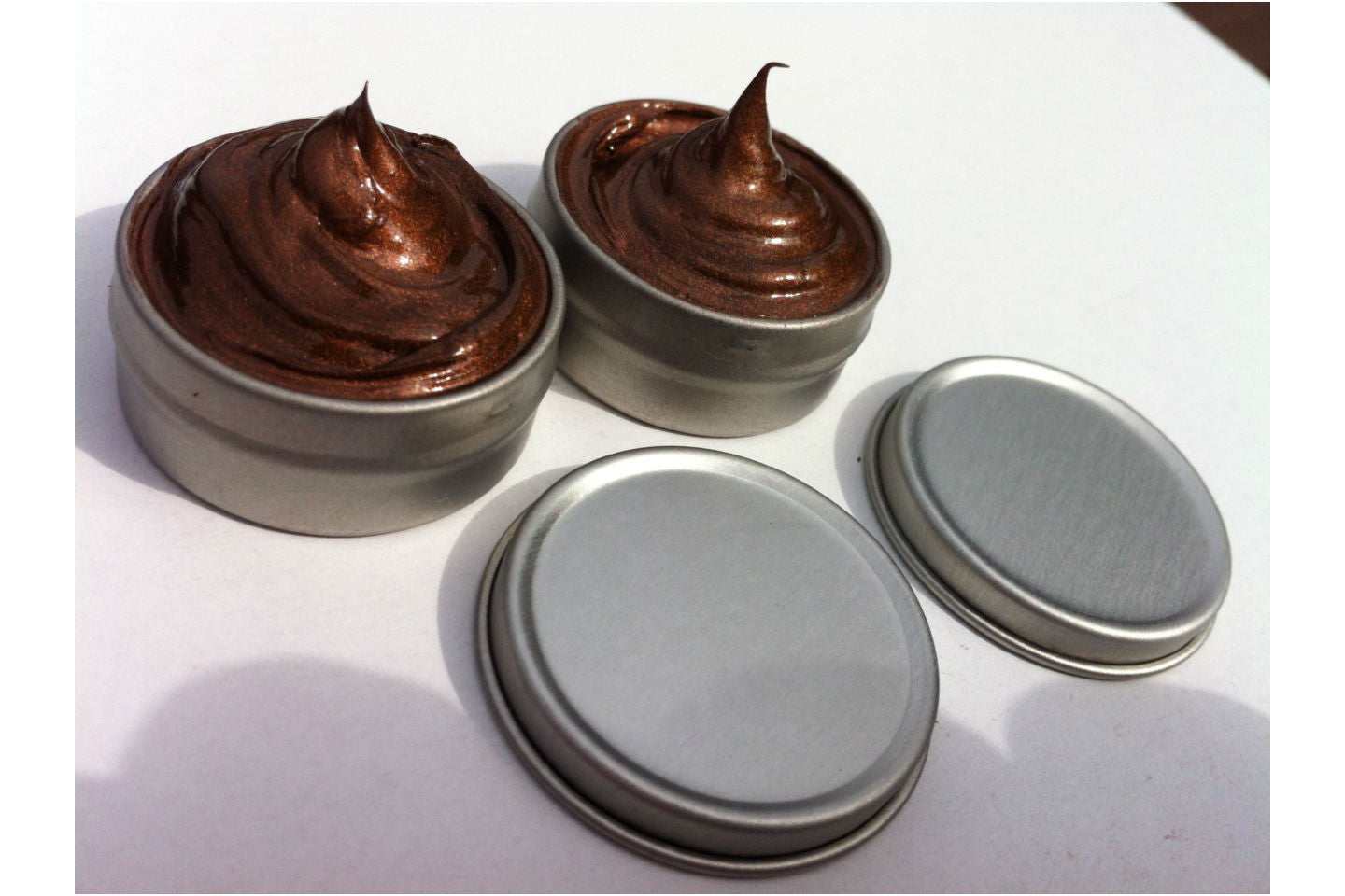 Copper Grease in tins for motorcycle maintenance and anti-seize application.