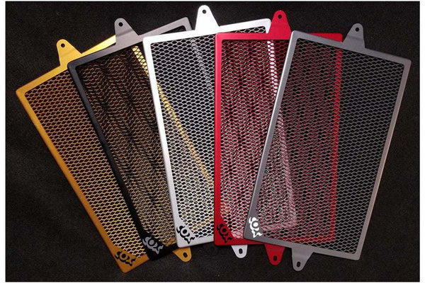 Radiator guards for Kawasaki Er6n by Cox Racing in various colors.