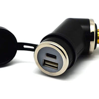 Hella / DIN power socket with angled USB-C and USB-A ports for motorcycles.