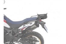 Honda Africa Twin motorcycle with Hepco Becker rear enlargement carrier for luggage.