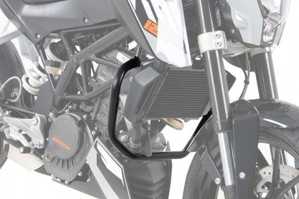 KTM Duke 200 engine guard by Hepco Becker in black, rugged terrain protection.