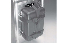Luggage hook for hard luggage with black strapping loops securely holding an additional canister.