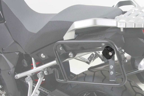 Lockable sidecase screw on a motorcycle side carrier with anti-theft securing mechanism by Hepco Becker.