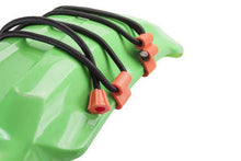 Rubber Boa Straps securing gear to a green dirt bike fender.